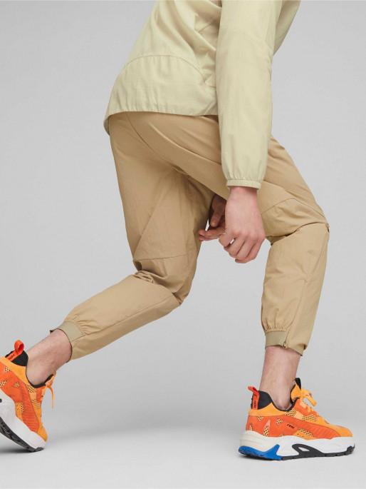 PUMA Спортно долнище TECH Infinite Land Woven