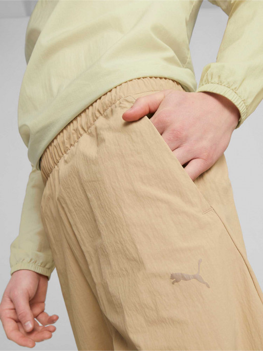 PUMA Спортно долнище TECH Infinite Land Woven