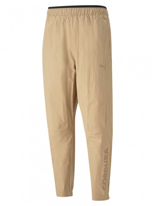 PUMA Спортно долнище TECH Infinite Land Woven