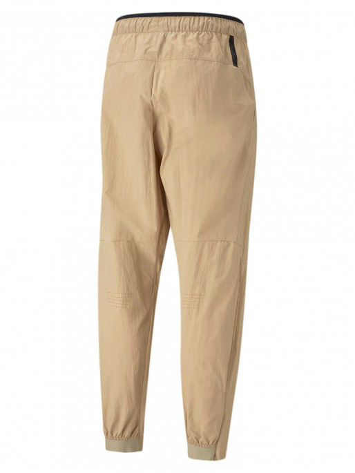 PUMA Спортно долнище TECH Infinite Land Woven